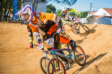 Image showing Alejandro Quim leading the race