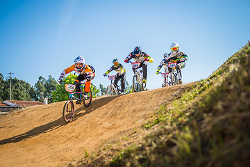 Image showing Alejandro Quim leading the race