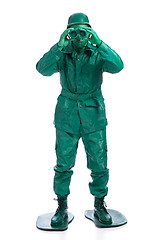 Image showing Man on a green toy soldier costume