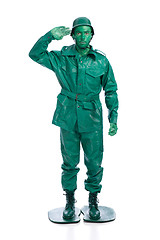 Image showing Man on a green toy soldier costume