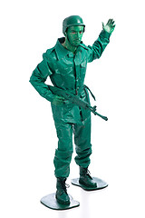 Image showing Man on a green toy soldier costume