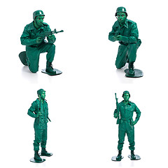 Image showing Four man on a green toy soldier costume