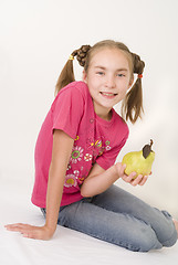 Image showing Girl with a pear IV