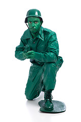 Image showing Man on a green toy soldier costume