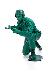 Image showing Man on a green toy soldier costume