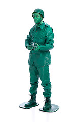 Image showing Man on a green toy soldier costume