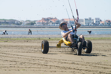 Image showing Ralph Hirner riding a kitebuggy