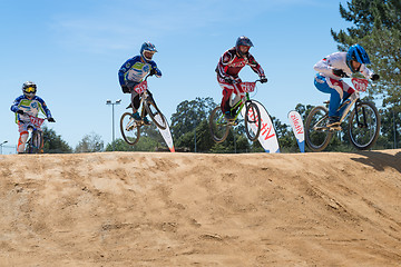 Image showing Cruiser riders jumping