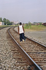 Image showing walking on the tracks