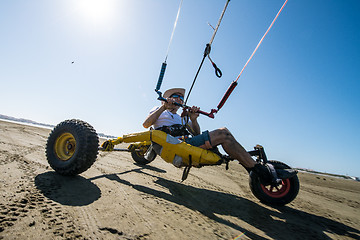 Image showing Ralph Hirner riding a kitebuggy