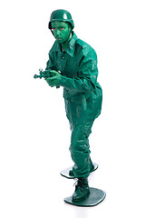 Image showing Man on a green toy soldier costume