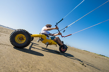 Image showing Ralph Hirner riding a kitebuggy