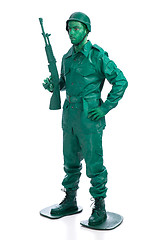 Image showing Man on a green toy soldier costume