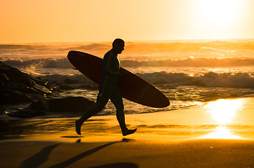 Image showing Surfer running