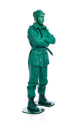 Image showing Man on a green toy soldier costume