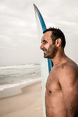 Image showing Surfer wathing the waves