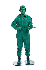 Image showing Man on a green toy soldier costume