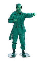 Image showing Man on a green toy soldier costume