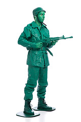 Image showing Man on a green toy soldier costume