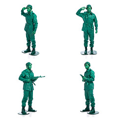 Image showing Four man on a green toy soldier costume