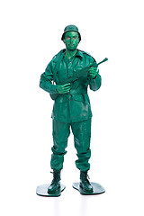 Image showing Man on a green toy soldier costume