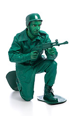 Image showing Man on a green toy soldier costume