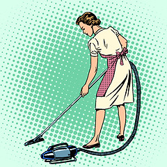 Image showing Woman vacuuming the room housewife housework comfort