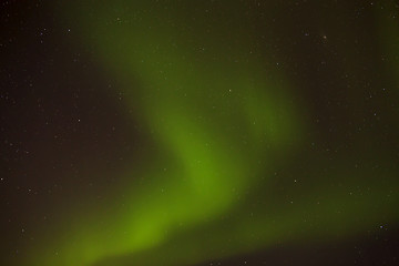 Image showing Dynamic aurora with bright stars in Iceland