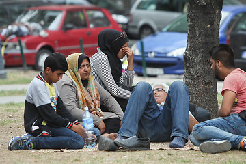 Image showing Refugees resting on ground in Belgrade
