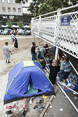 Image showing Syrian refugees in the parking lot