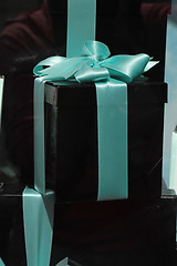 Image showing Gift box with blue ribbon