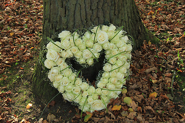 Image showing Heart shaped sympathy flowers