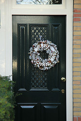 Image showing Merry Christmas decoration on front door