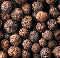 Image showing black aromatic peppercorns background