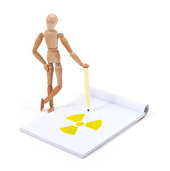 Image showing Wooden mannequin writing - Radioactive