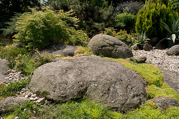 Image showing Beautiful spring garden design with stones