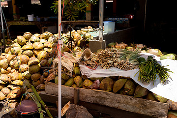 Image showing empty shels of fresh coconuts in the market