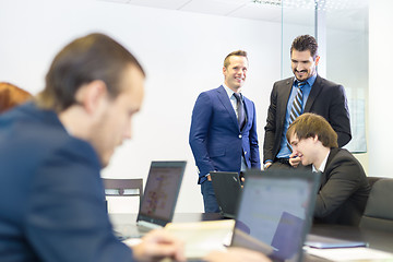 Image showing Business people in modern office.