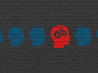 Image showing Education concept: head with gears icon on wall background