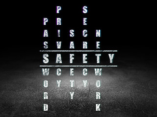 Image showing Protection concept: word Safety in solving Crossword Puzzle