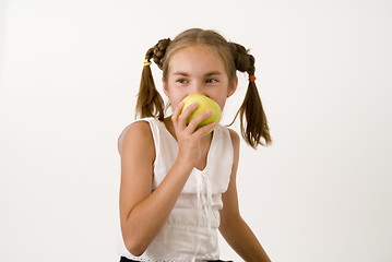 Image showing Girl eating apple I