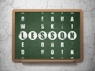 Image showing Education concept: word Lesson in solving Crossword Puzzle