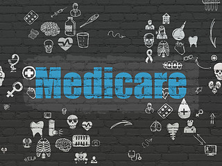 Image showing Health concept: Medicare on wall background