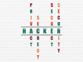 Image showing Protection concept: word Hacker in solving Crossword Puzzle