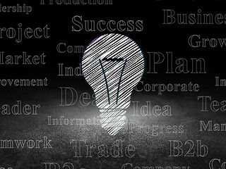 Image showing Business concept: Light Bulb in grunge dark room