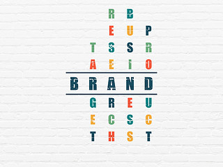 Image showing Marketing concept: word Brand in solving Crossword Puzzle