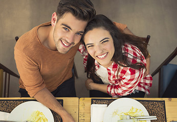 Image showing Young couple at the restaurant