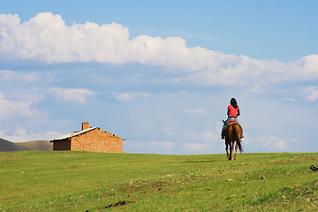Image showing Girl Ridding Horse