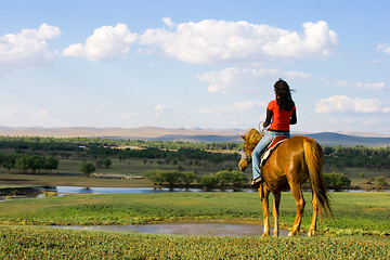 Image showing Girl Ridding Horse