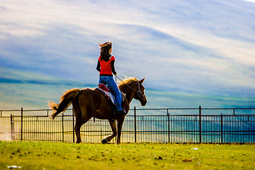 Image showing Girl Ridding Horse